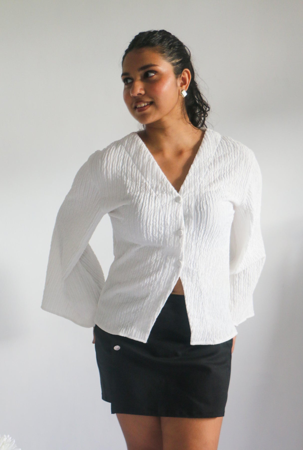 Flared button up long sleeve top